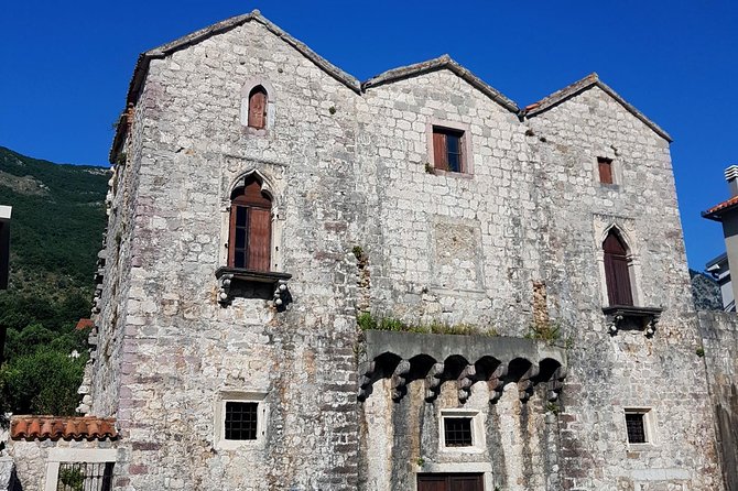 Bike tour - Kotor Bay circle and visit Our Lady of the Rock - Tre Sorelle Palace stop: a quick story and a photo break