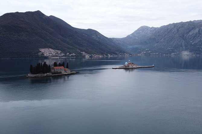 Boat tour to Lady of the Rock , Submarine base & Blue Cave swim - The Mamula fortress perspective during the Perast portion