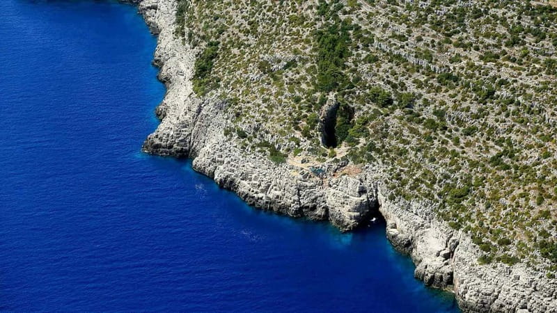 Bokokotor Bay, Blue Cave and panorama of Mamula - Blue Cave: sky-blue water, snorkel gear, and quick swim time