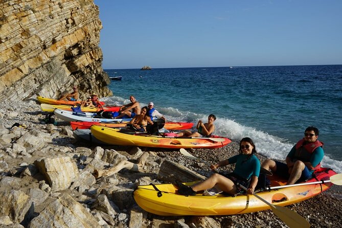 Budva Bay: Kayak & SUP Tour to Coastal Caves - Stop 2 Blue Lagune: snorkeling gear and clear-water fun