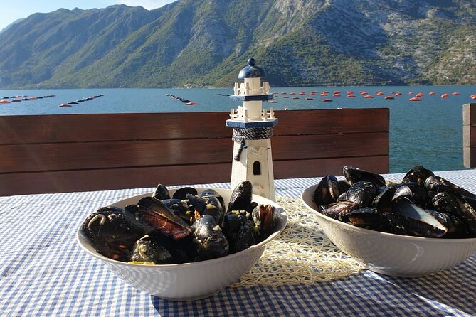 Private Gastro Cruise: Blue Cave & Organic Seaside Lunch - Our Lady of the Rocks: short island time, UNESCO views, and strict church rules
