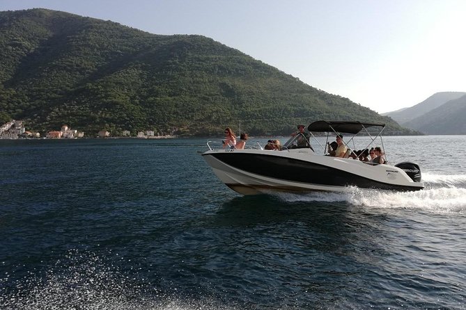 Speed Boat Trip: Kotor Bay attraction , Blue Cave and beach time - Dobrec Beach break: swim time, snacks, and a calmer pace
