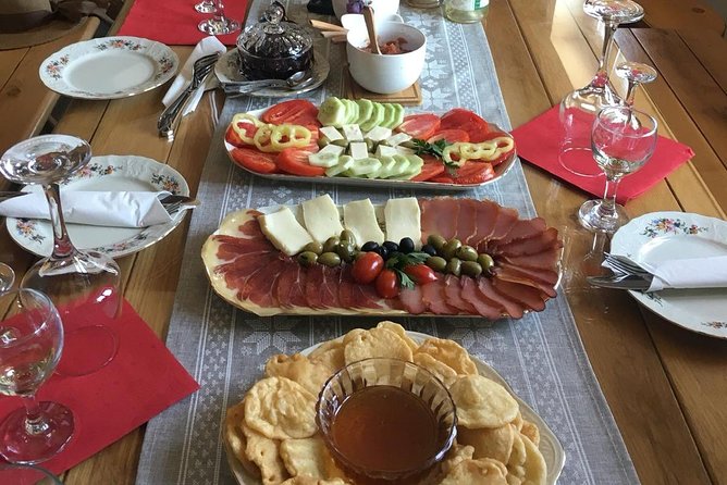 Wine tasting and magical tour from Kotor, Budva, Tivat (Lovcen,Skadar lake) - The Rvasji winery stop: six wines, sweet liqueurs, brandies, and a serious Montenegrin plate
